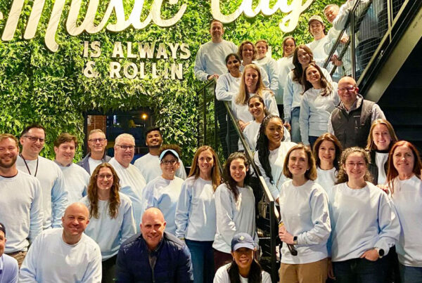 EvidenceCare team celebrating in Nashville, Tennessee